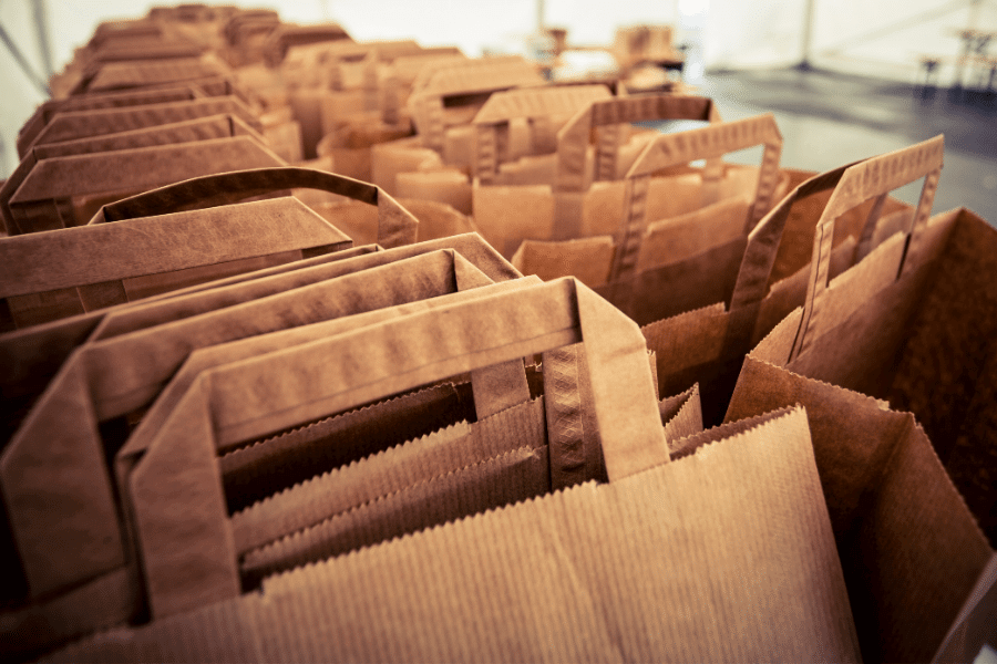 paper bags require four times more raw materials and create 50 times more water pollution than plastic bags
