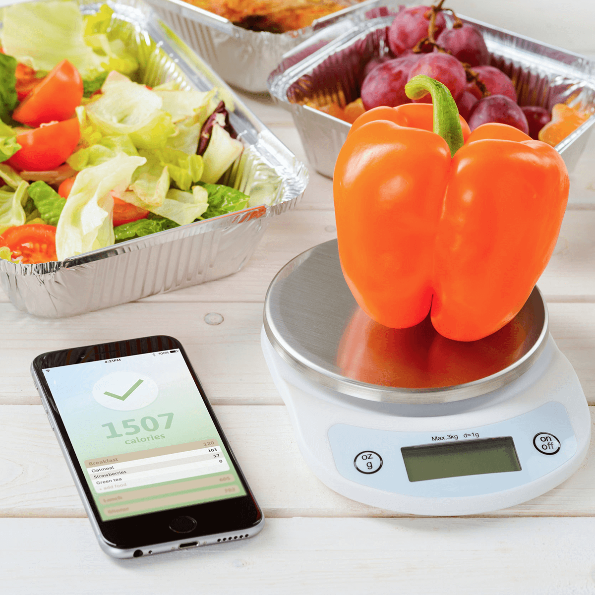 Image of a calorie tracking app and healthy foods.